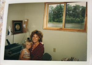 Lana Adam and daughter, Dawn, on her lap in 1981.